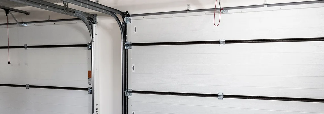 Fix Folding Garage Door Jerking in Sunrise, Florida