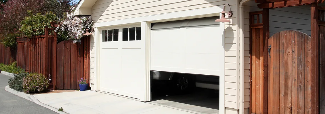 Fix Metal Garage Door Jerking in Sunrise, Florida